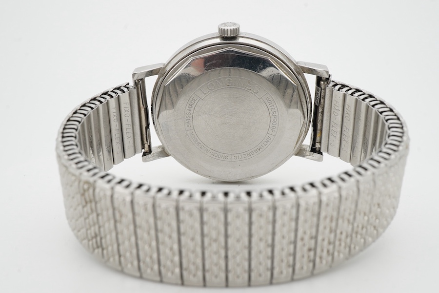 Longines, a stainless steel automatic wristwatch, ref.7844-3, 1960s, circular brushed silvered dial with baton indicators and date wheel aperture, dial and movement signed Longines, case back interior signed Longines, nu